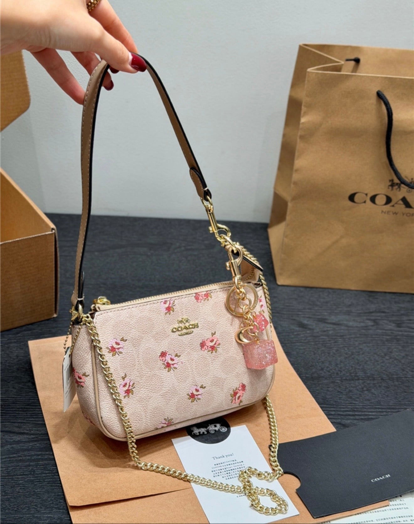Coach bag with charm